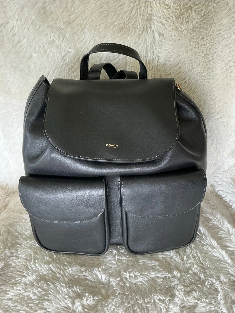 Coach Crosby Black Leather Backpack with Dual Front Pockets and Gold Logo